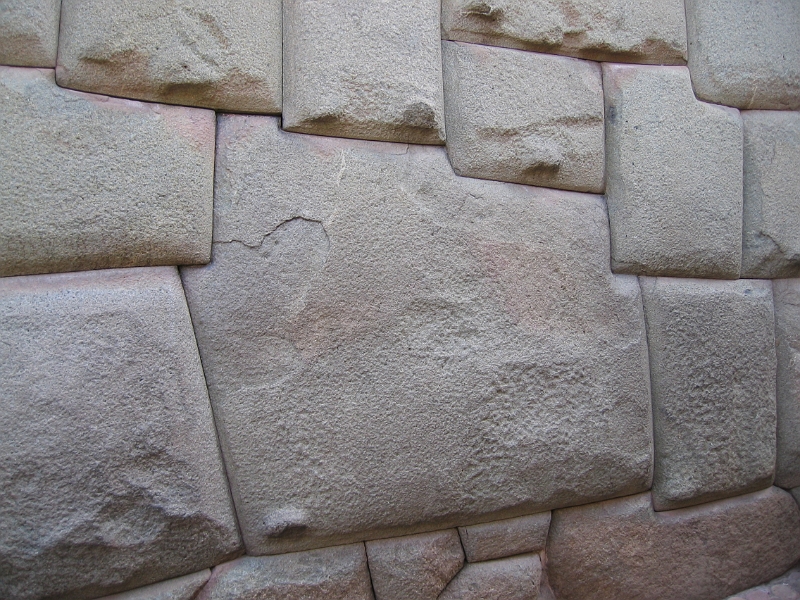 0806120044.JPG - Day 6, Thursday, June 12, Cuzco. Twelve cornered stone, most complex cut known among all Incan architecture.