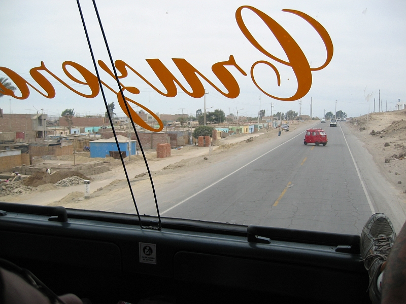 0806200003.JPG - Day 14, Friday, June 20. Enroute by bus from Nazca to Lima on the Pan Am Highway.
