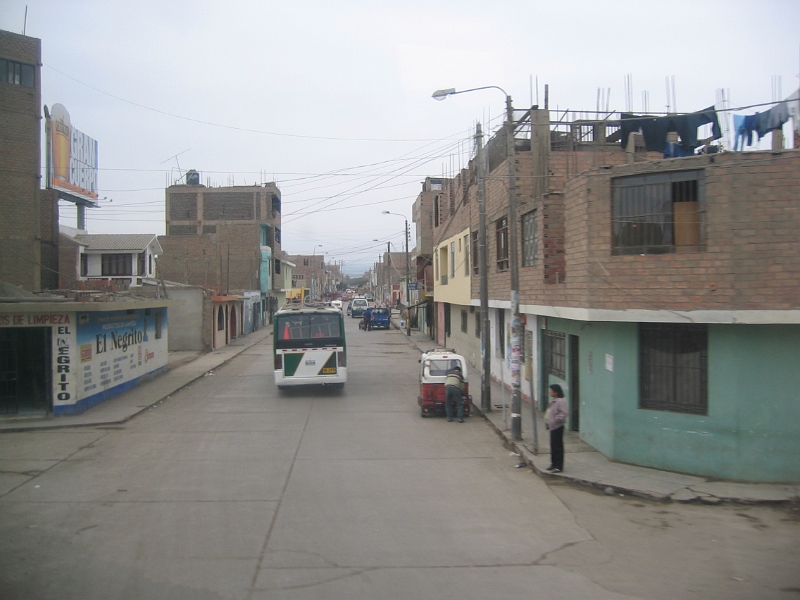 0806200004.JPG - Day 14, Friday, June 20. Enroute by bus from Nazca to Lima on the Pan Am Highway.